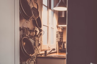 A cozy kitchen with warm lighting and inviting atmosphere.