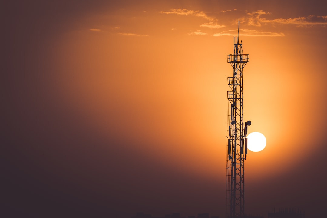 silhouette of tower during sunset