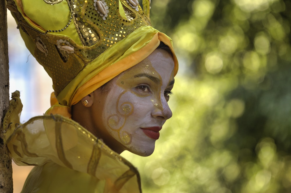 woman in yellow and brown hijab