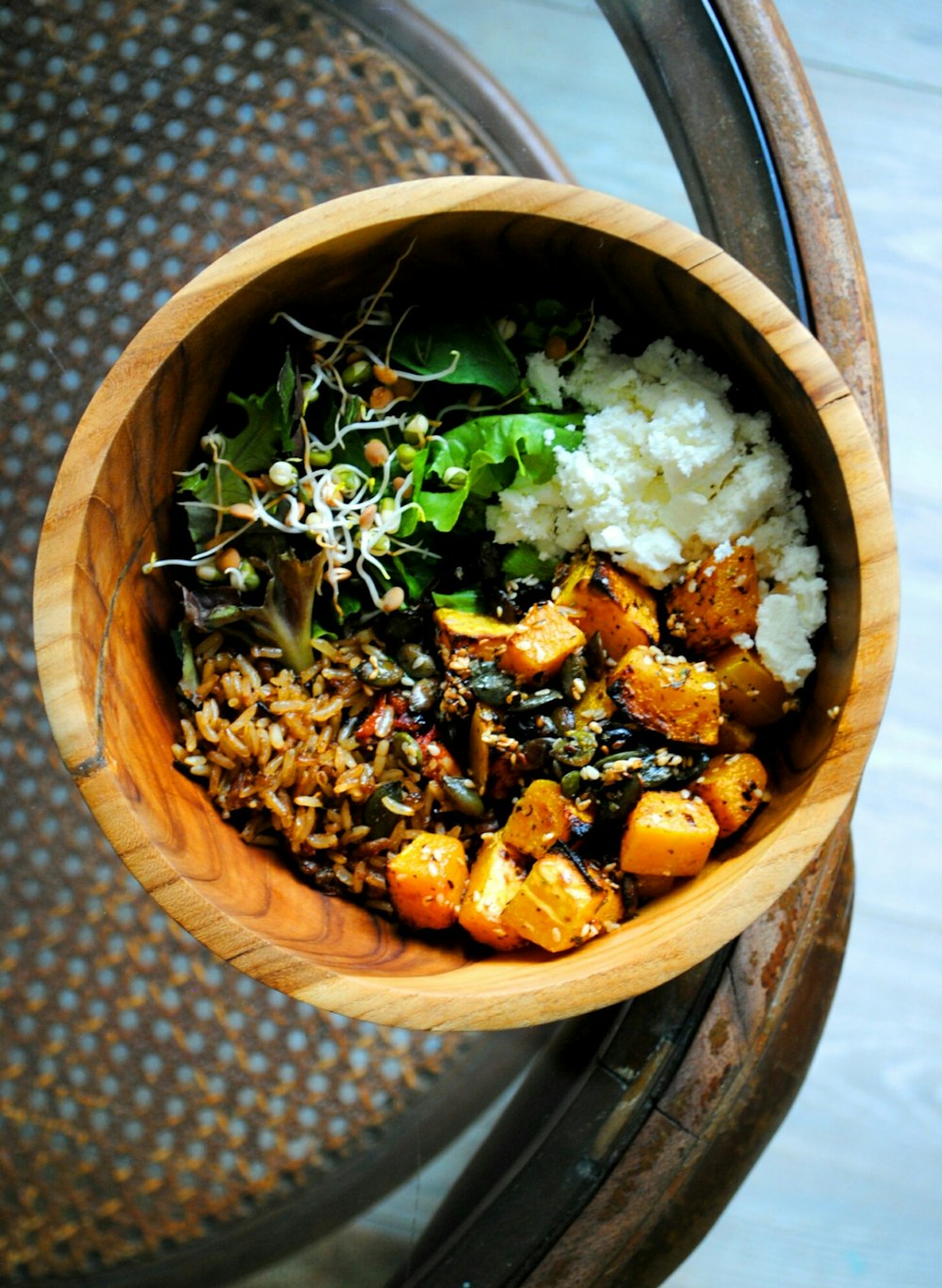 cooked food in brown wooden bowl