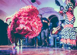 A vibrant flamenco dancer performing passionately in a traditional Madrid tablao.
