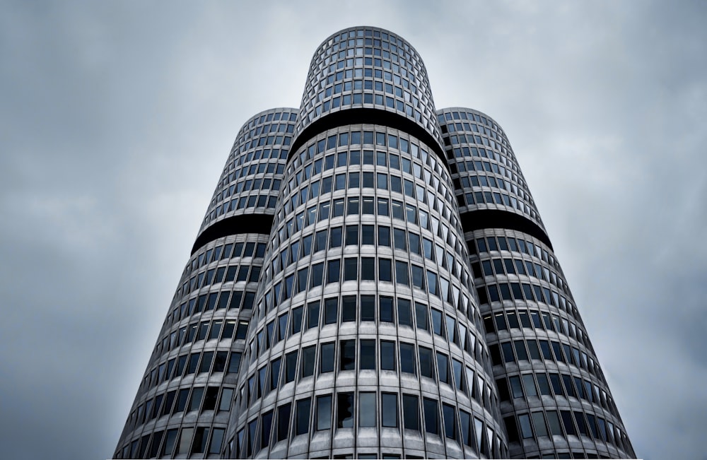 blue and white building under white clouds during daytime