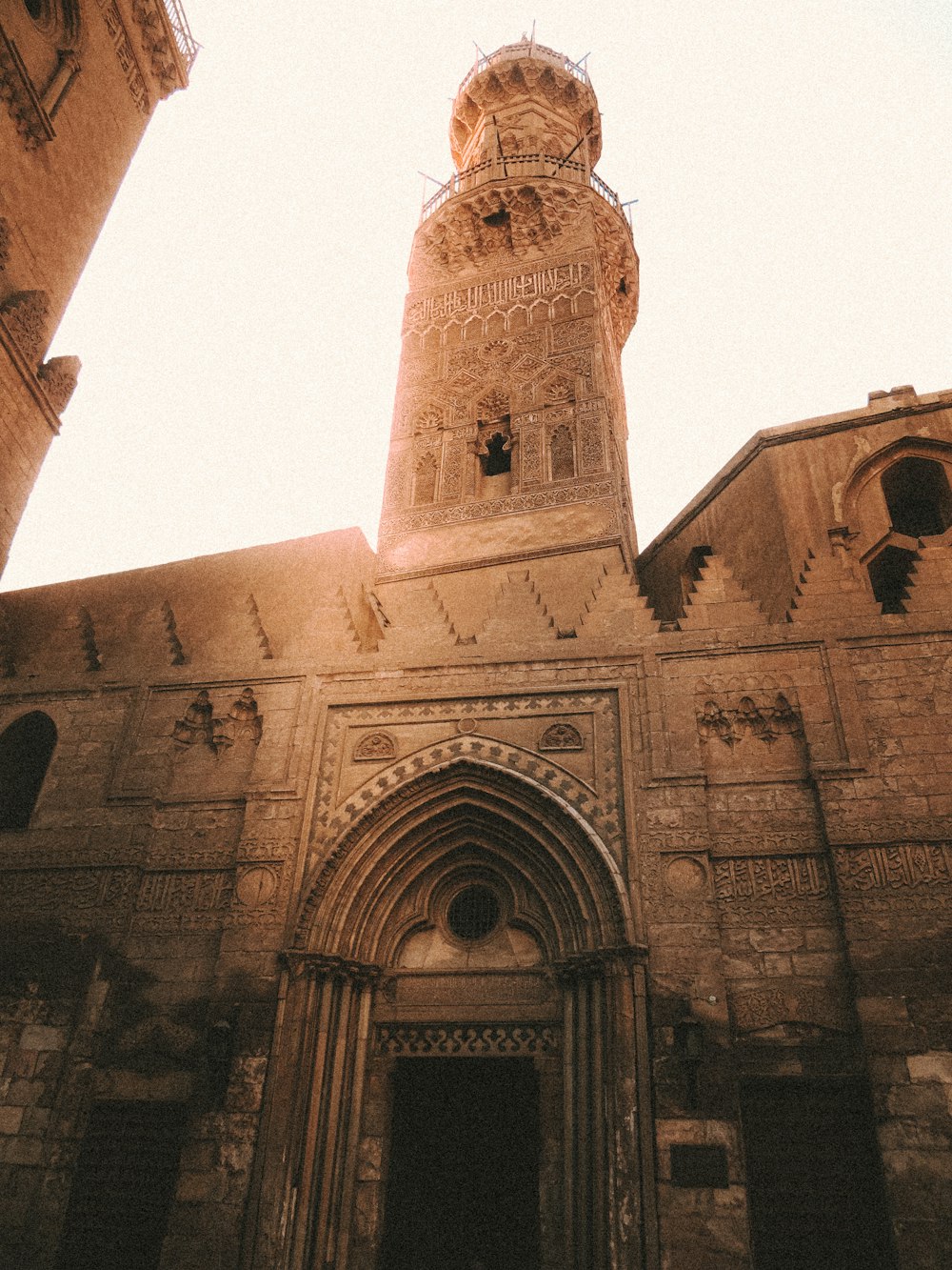 a tall tower with a clock on top of it