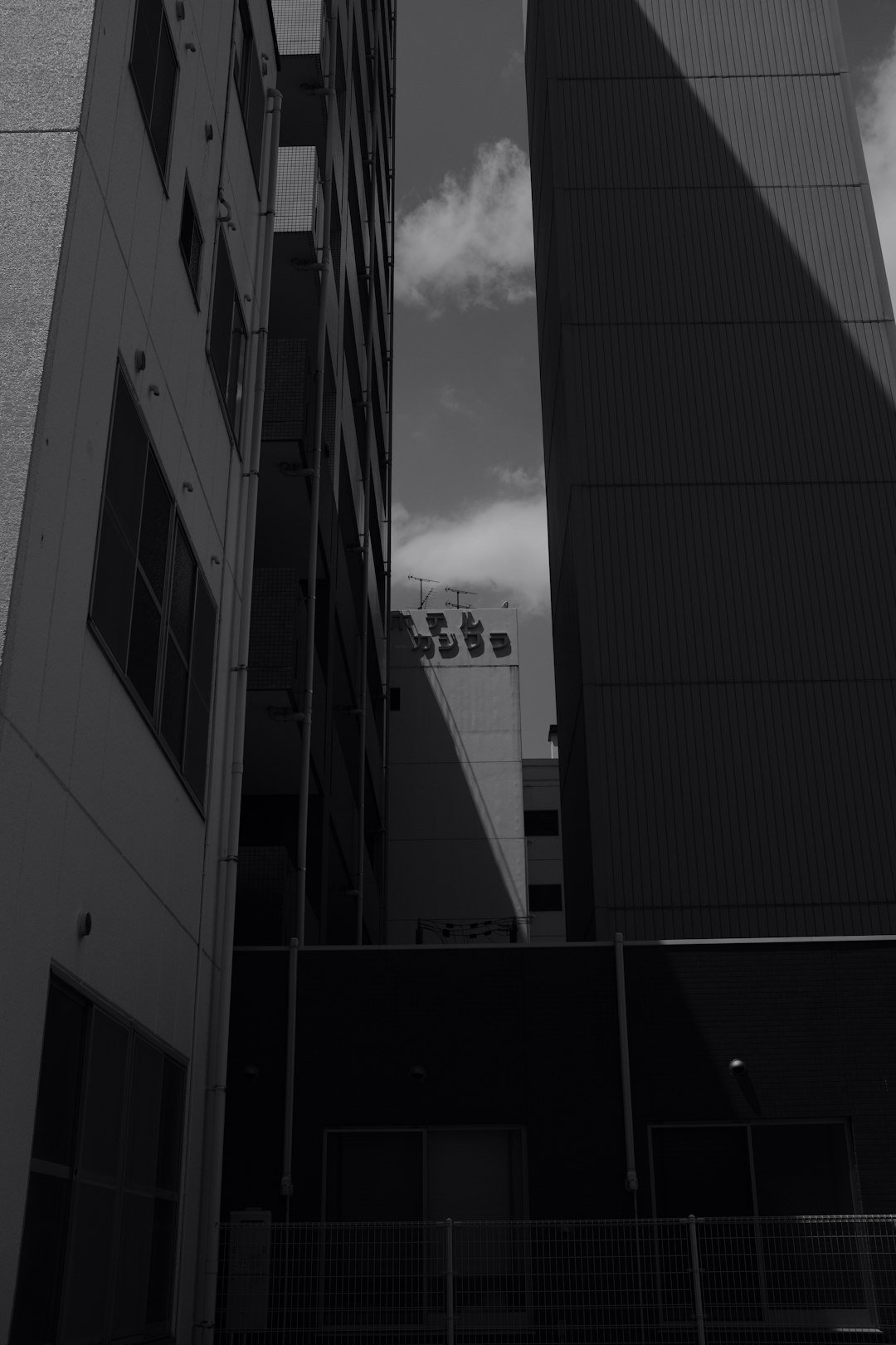 grayscale photo of high rise building