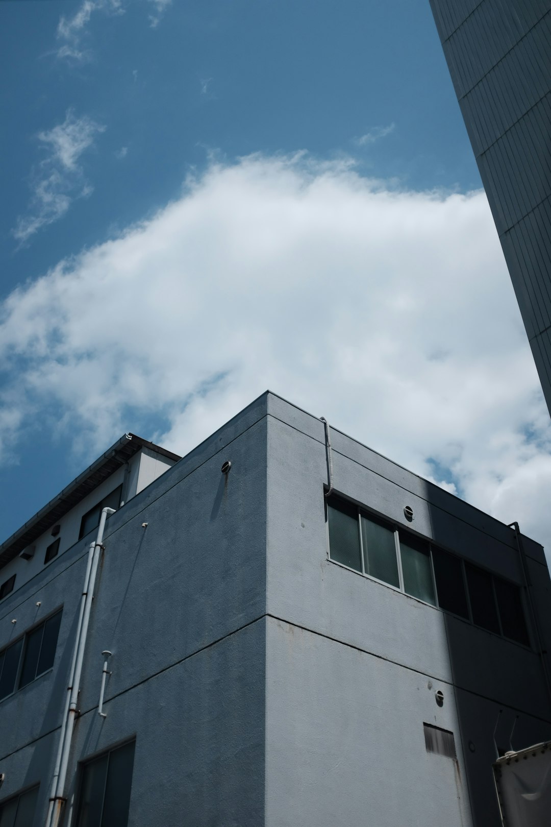 gray concrete building under blue sky during daytime