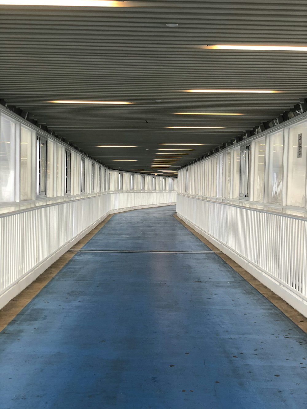 blue hallway with white walls