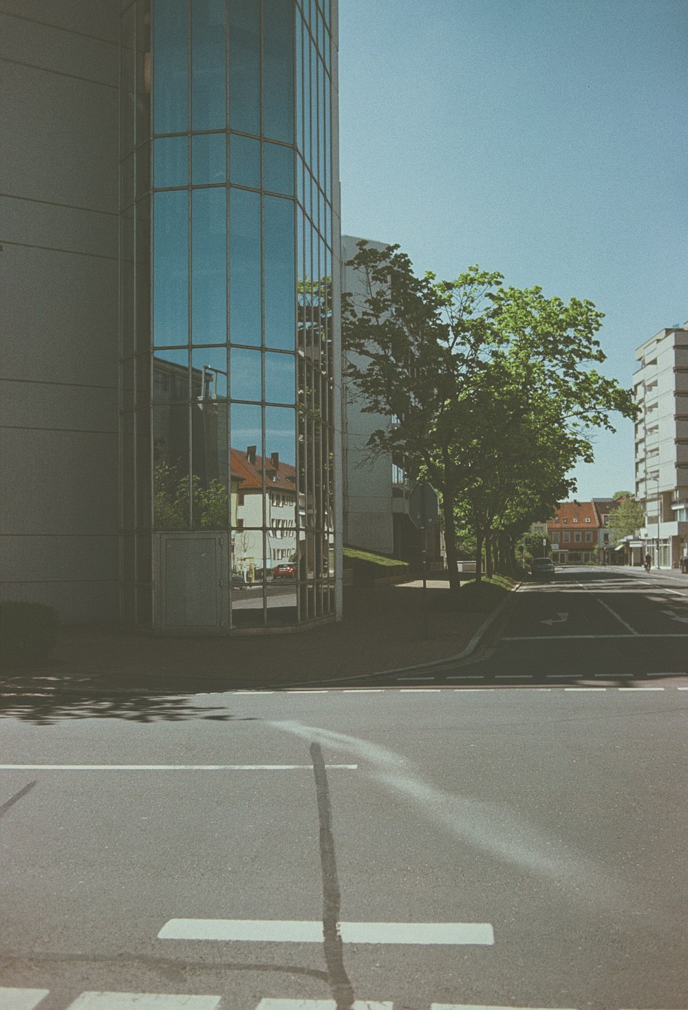 black car on road near building during daytime