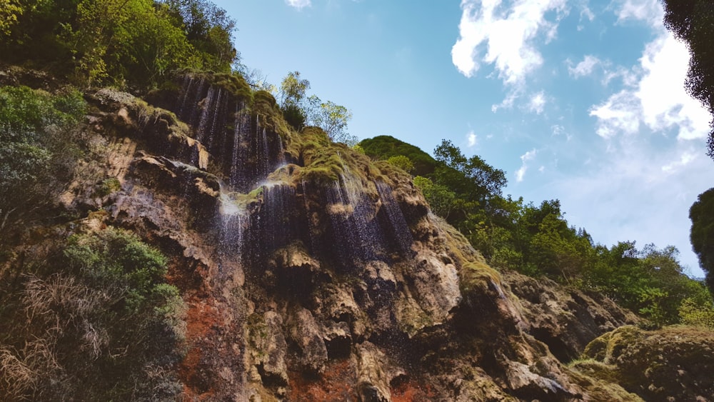 green and brown mountain under blue sky during daytime