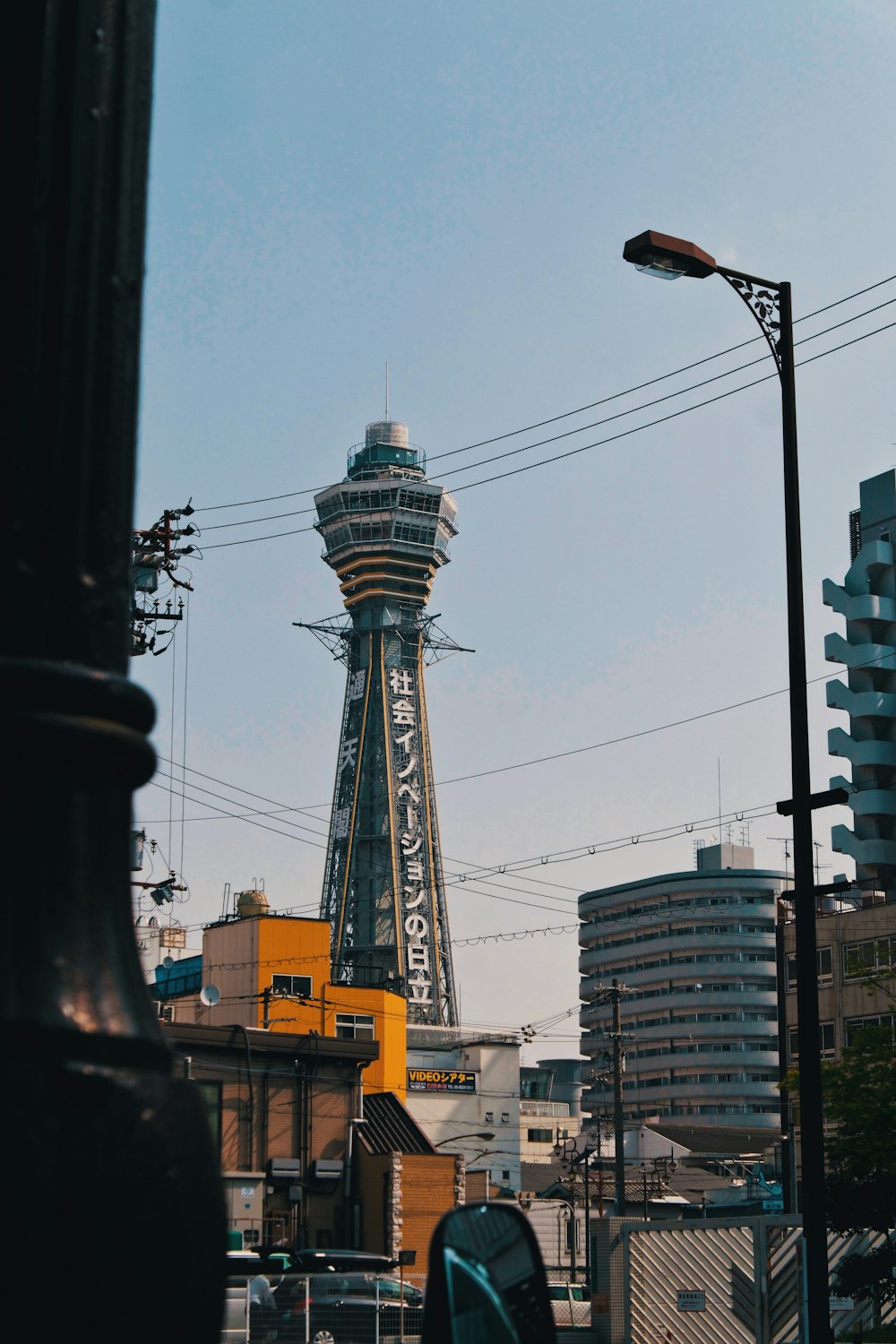 black and green tower during daytime