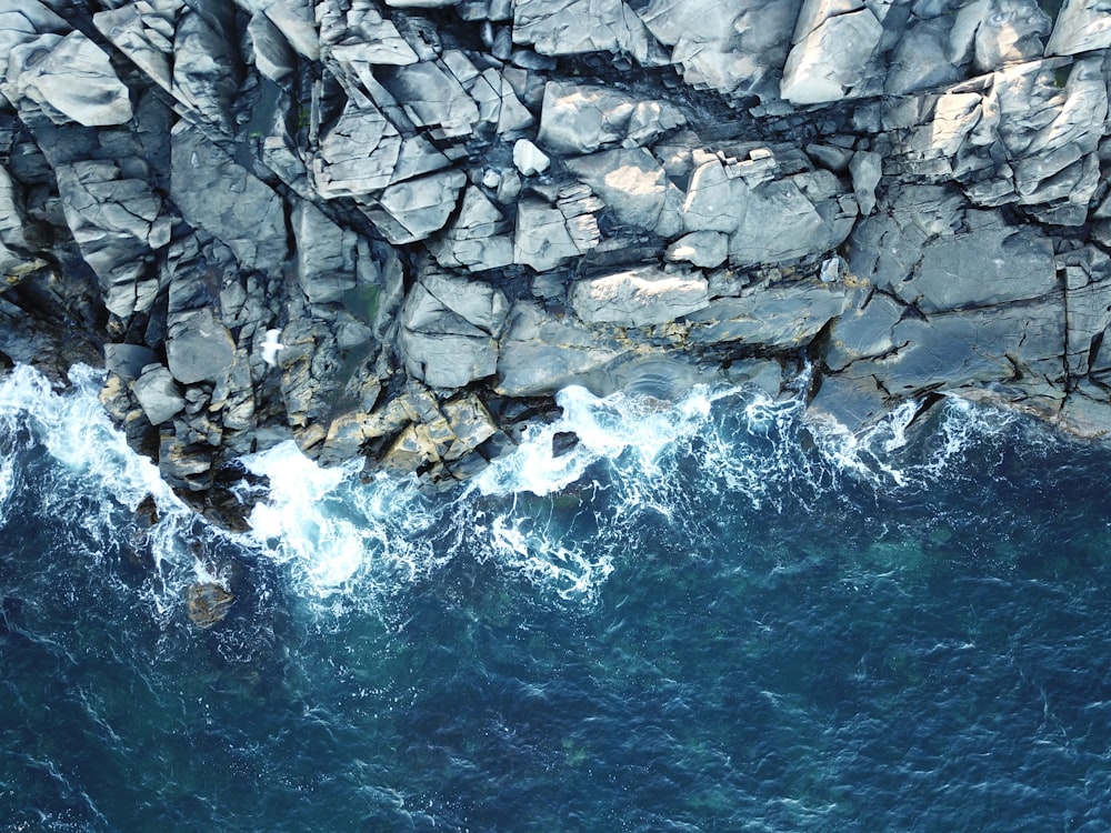 gray rocky shore with water