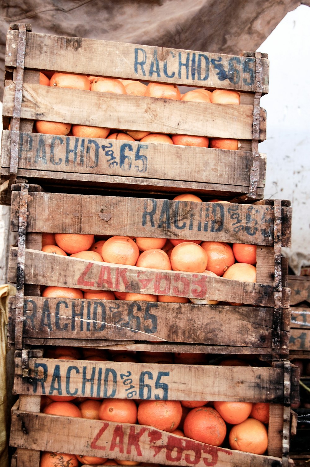 brown wooden crates with brown eggs