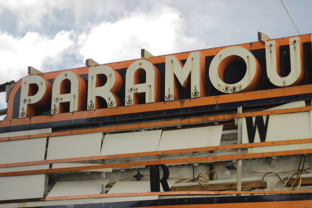 a sign that says paramou on top of a building