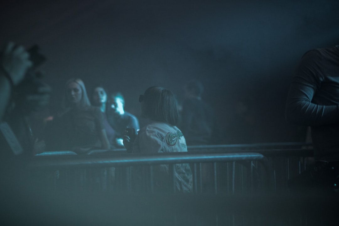 3 women standing on stage