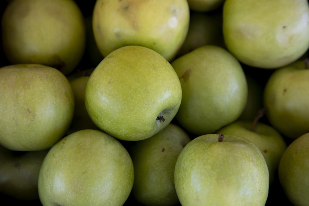 green apple fruit on brown wooden table