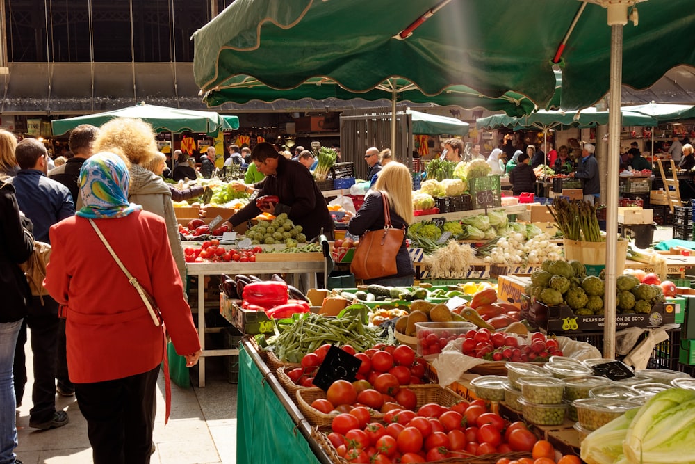 people in market during daytime