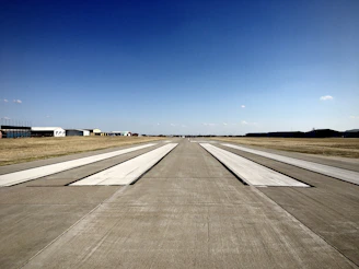 A panoramic view of a military airbase runway restored with advanced surface protection systems.