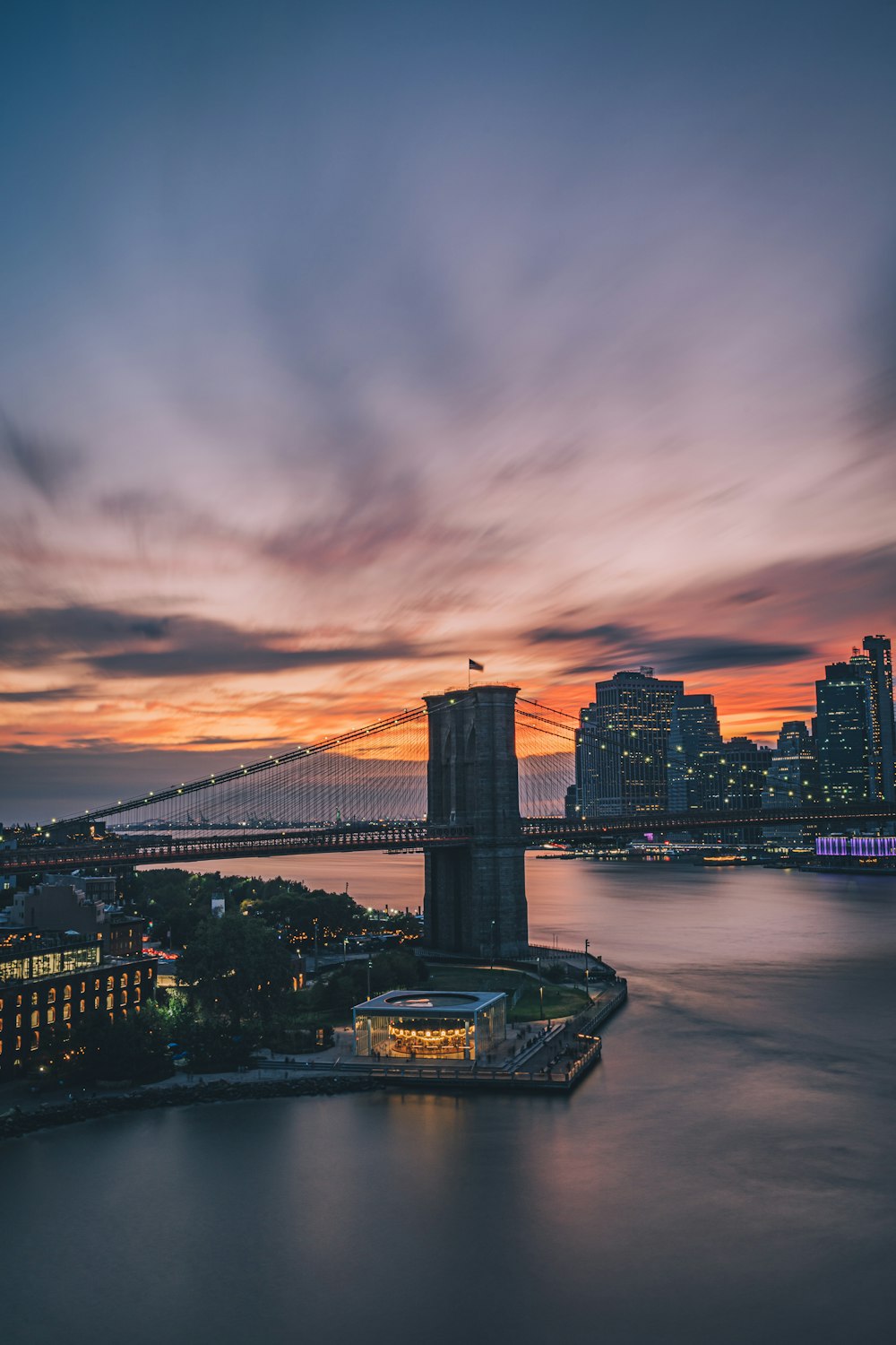 bridge over river during night time