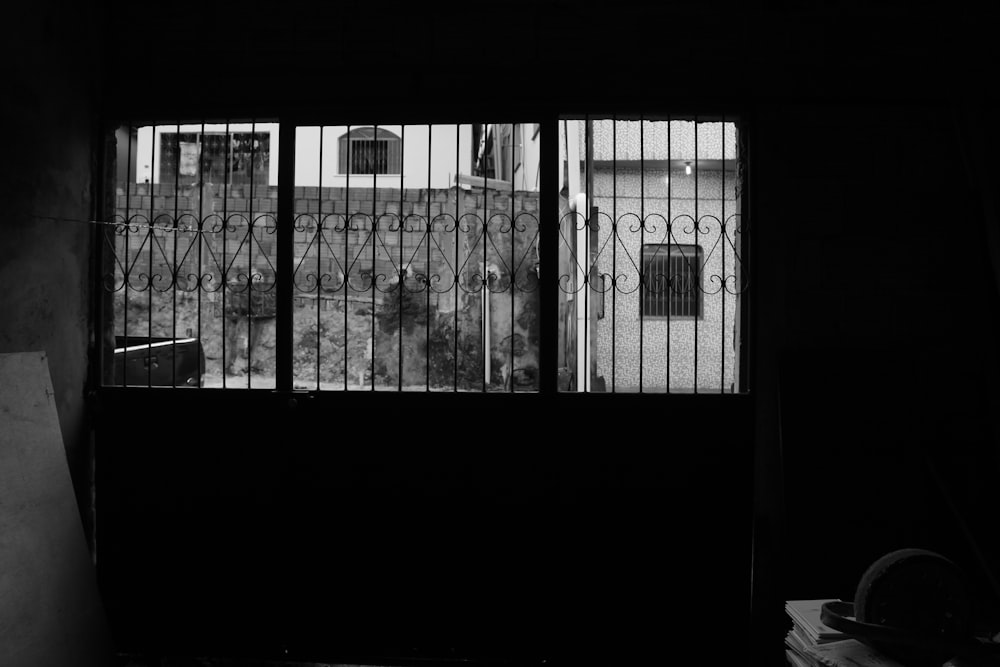 black metal window frame during daytime