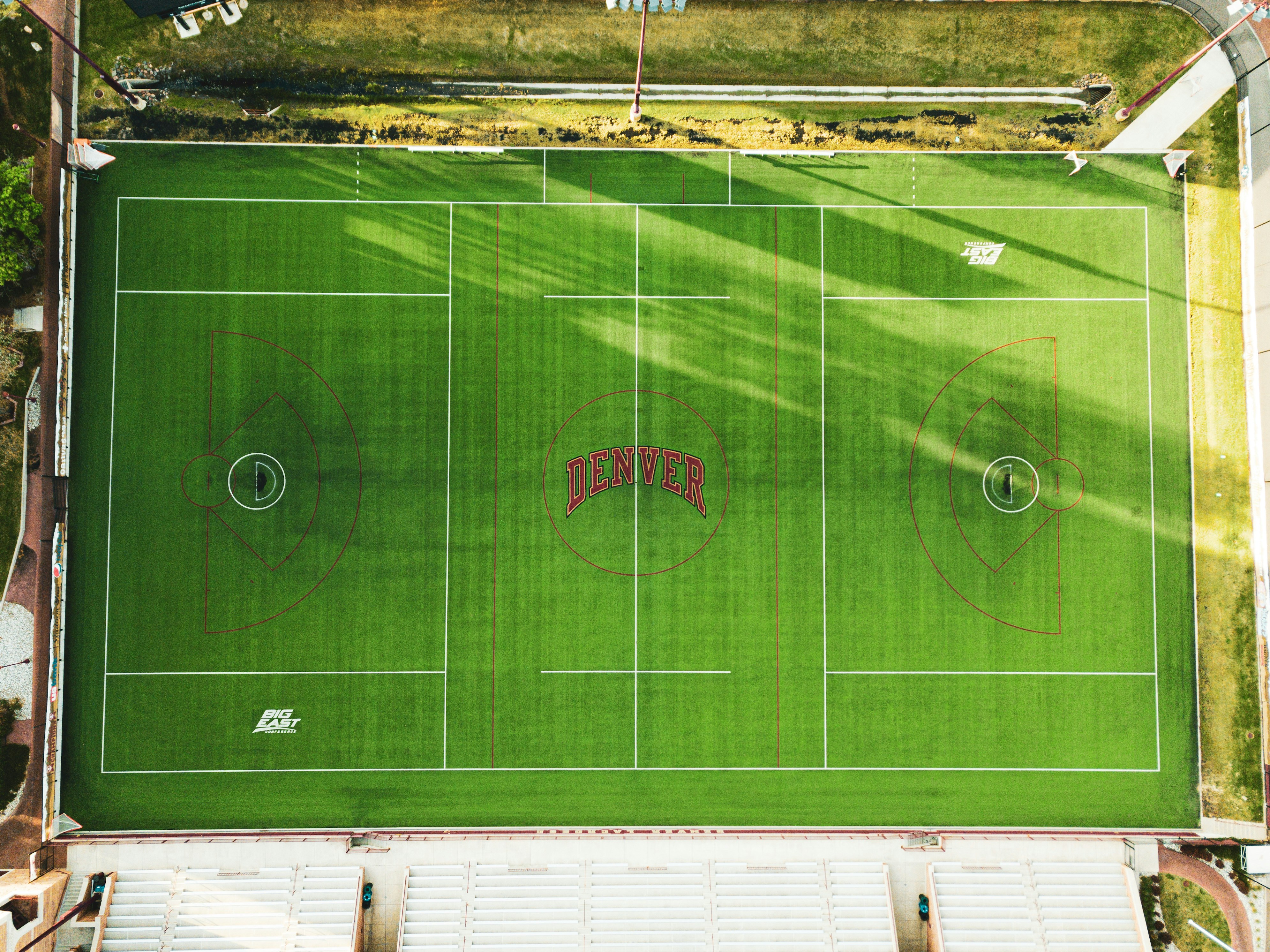 aerial view of soccer field during daytime photo – Free Green Image on