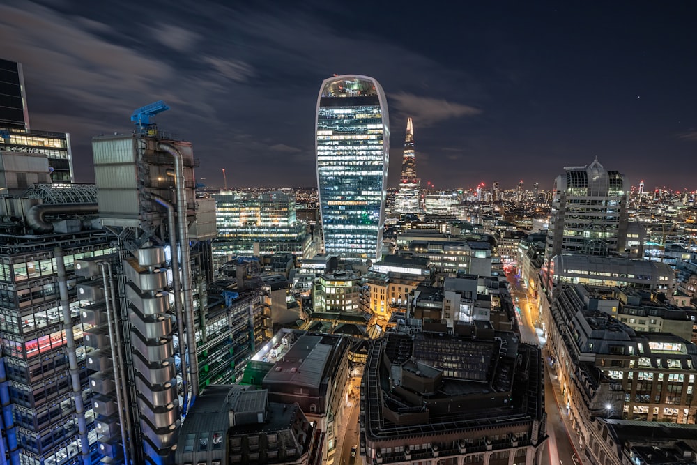 city with high rise buildings during night time