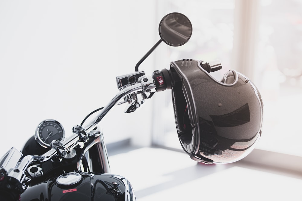 red and black motorcycle in a white room