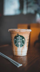 white and brown starbucks cup