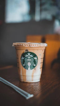 white and brown starbucks cup
