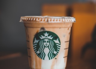 white and brown starbucks cup