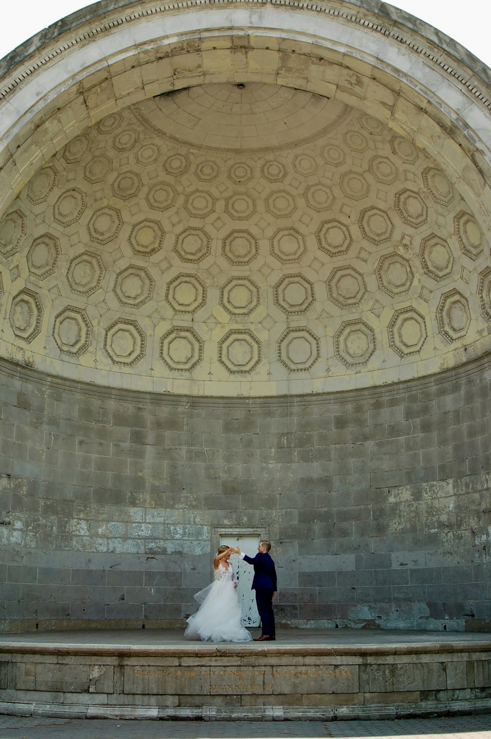 man in white dress shirt and woman in white dress