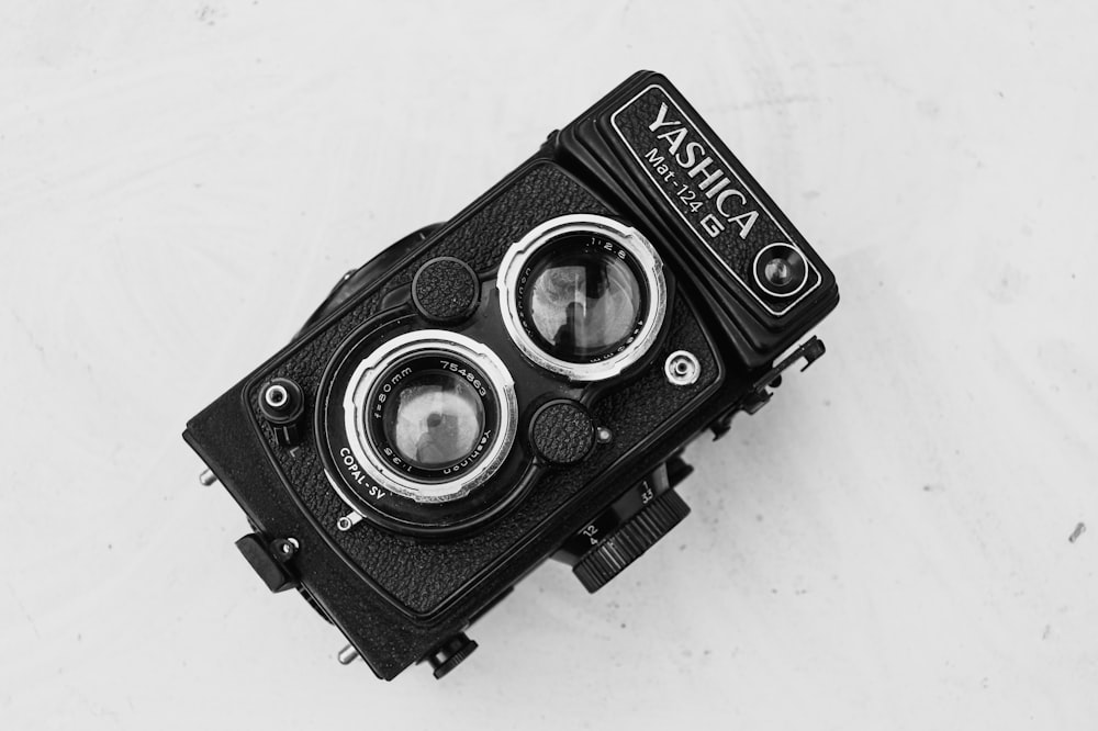 black and silver nikon camera