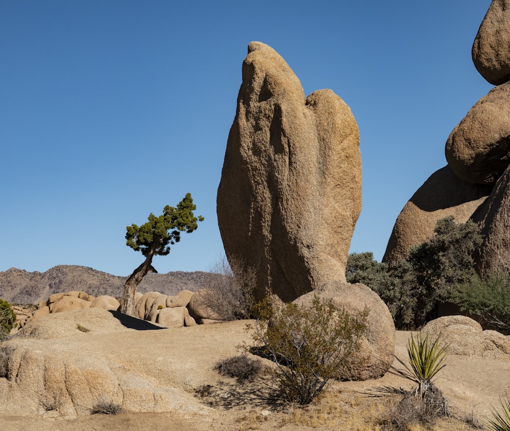 brown rock formation under blue sky during daytime