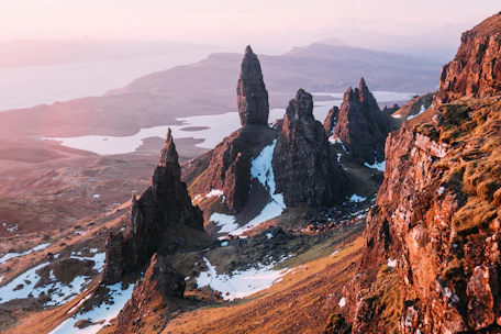 brown rocky mountain under blue sky during daytime