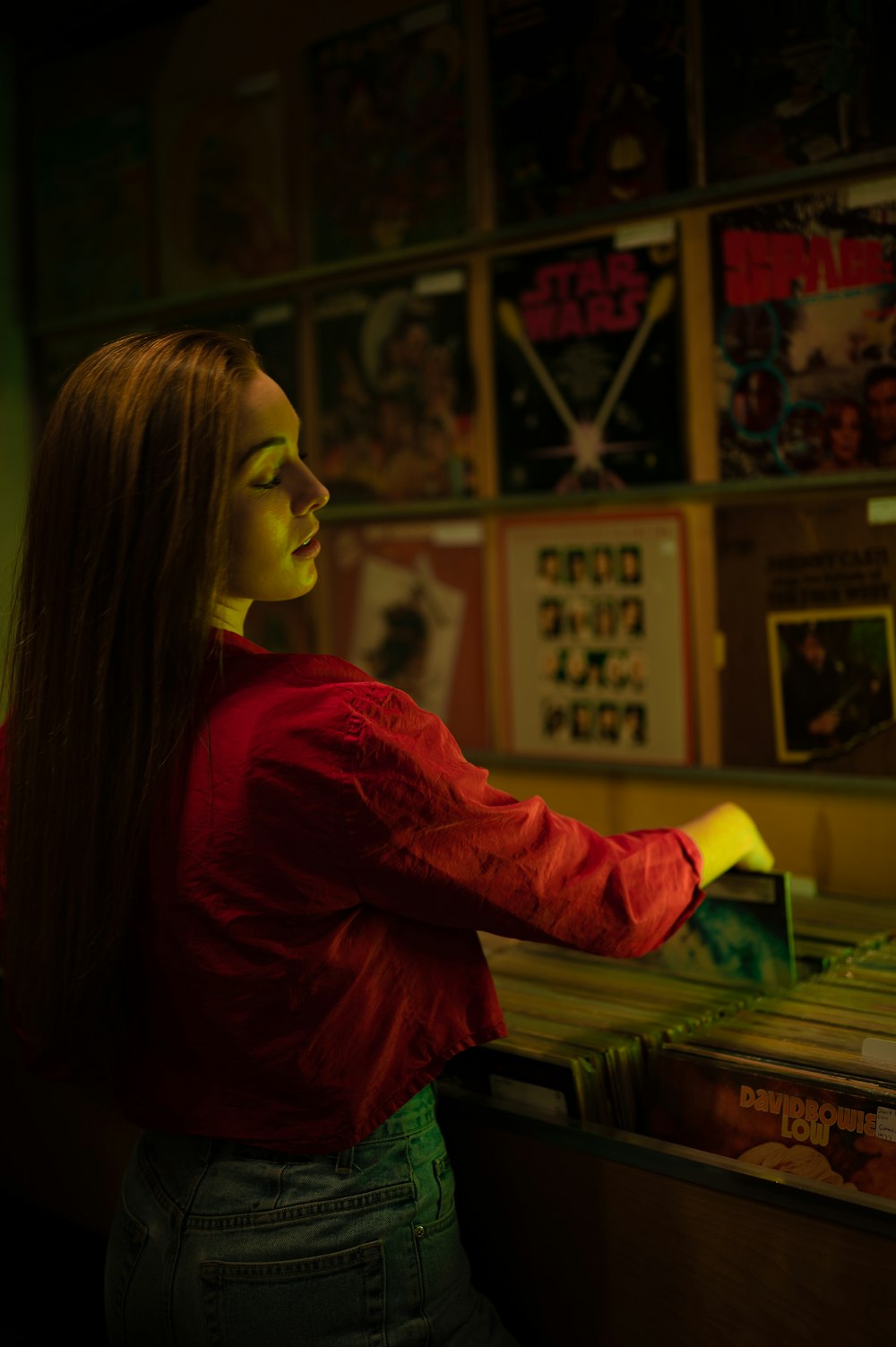 woman in red long sleeve shirt wearing eyeglasses