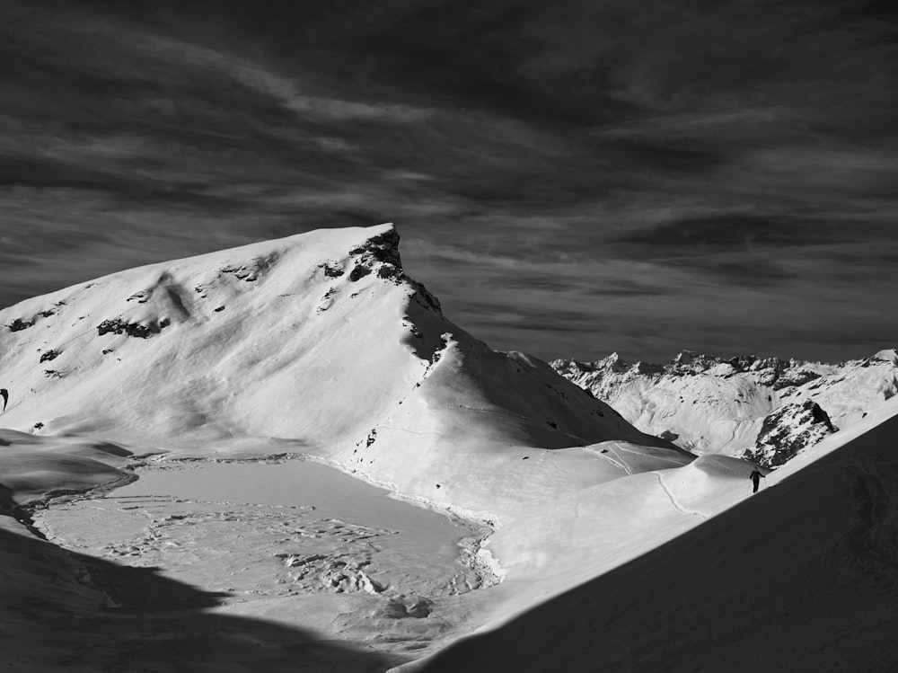 grayscale photo of snow covered mountain