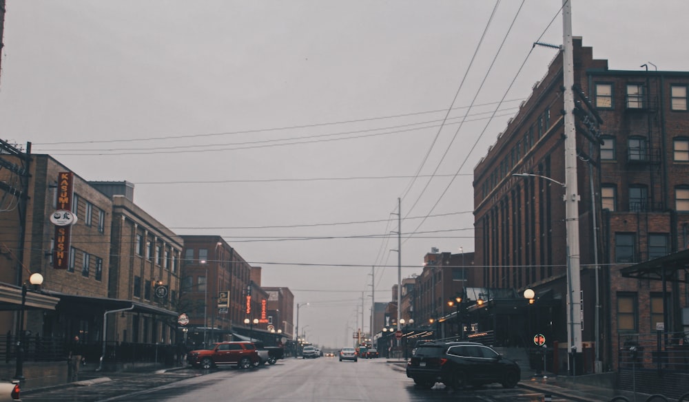 cars parked on side of the road during daytime