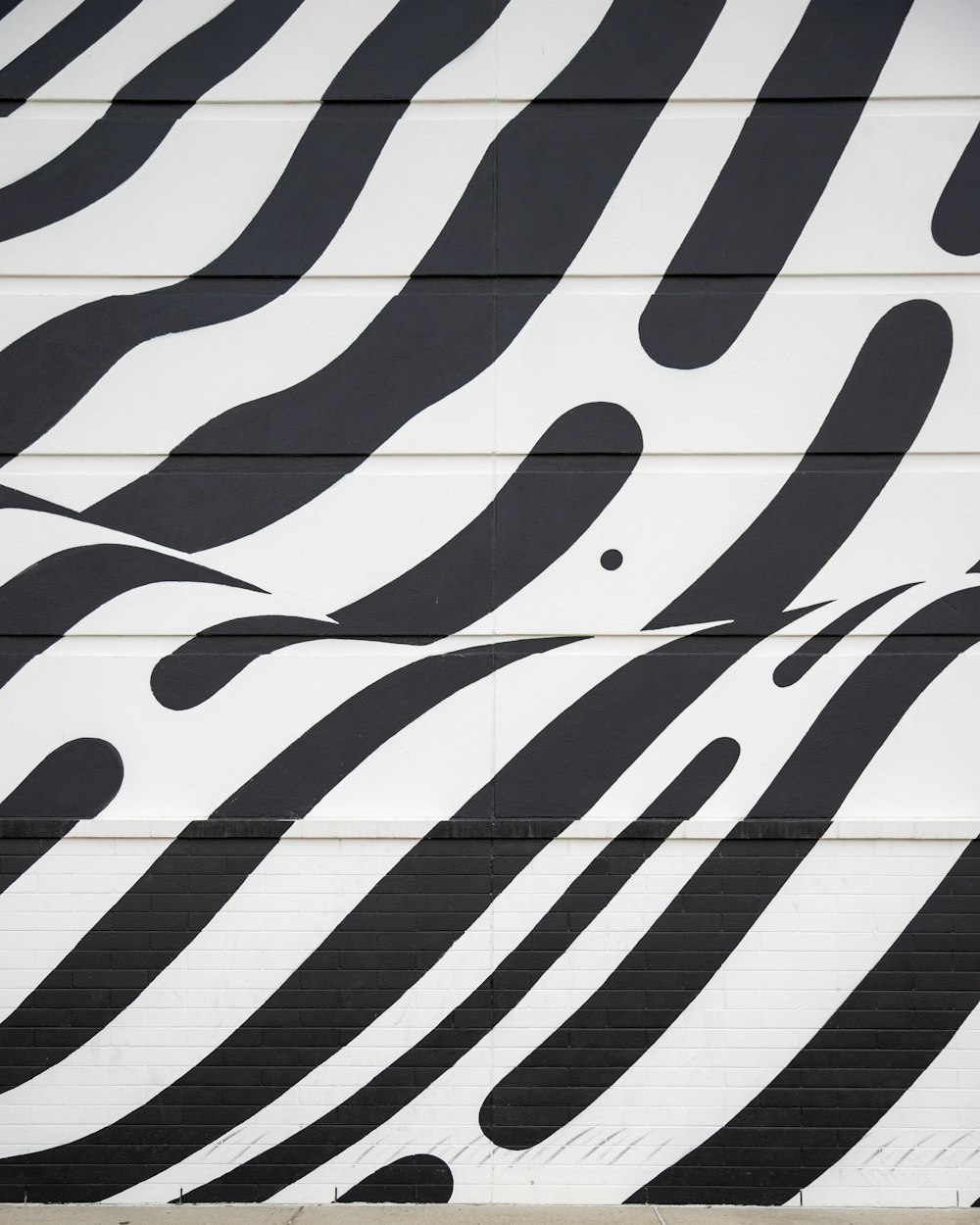 white and black striped textile