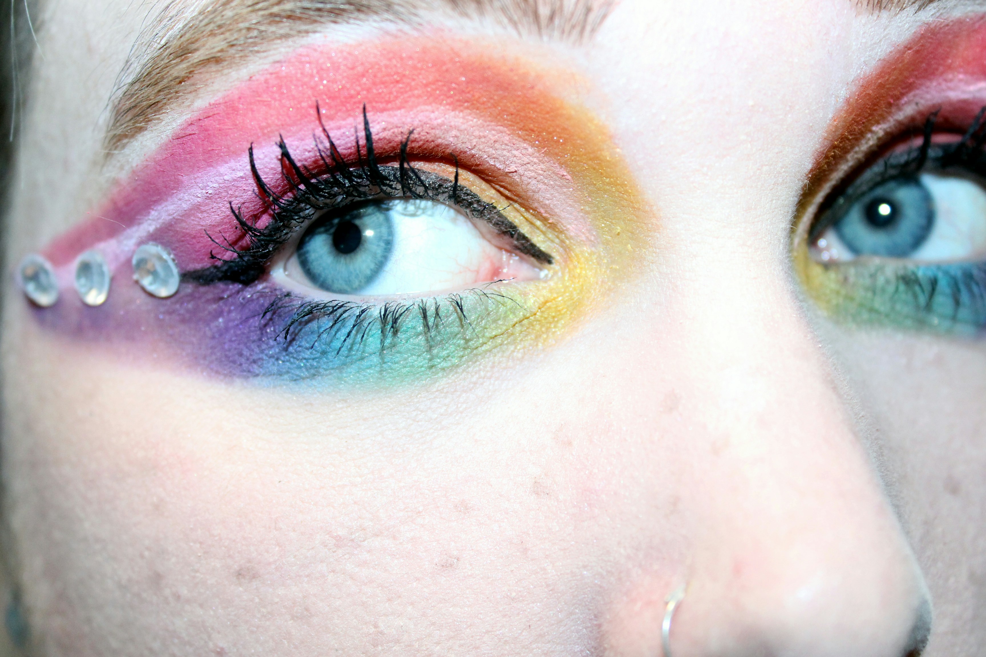 persons eye with green eyes