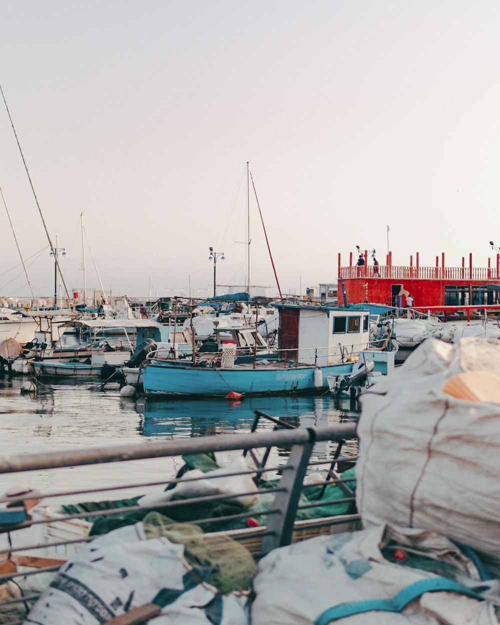 boats on dock during daytime