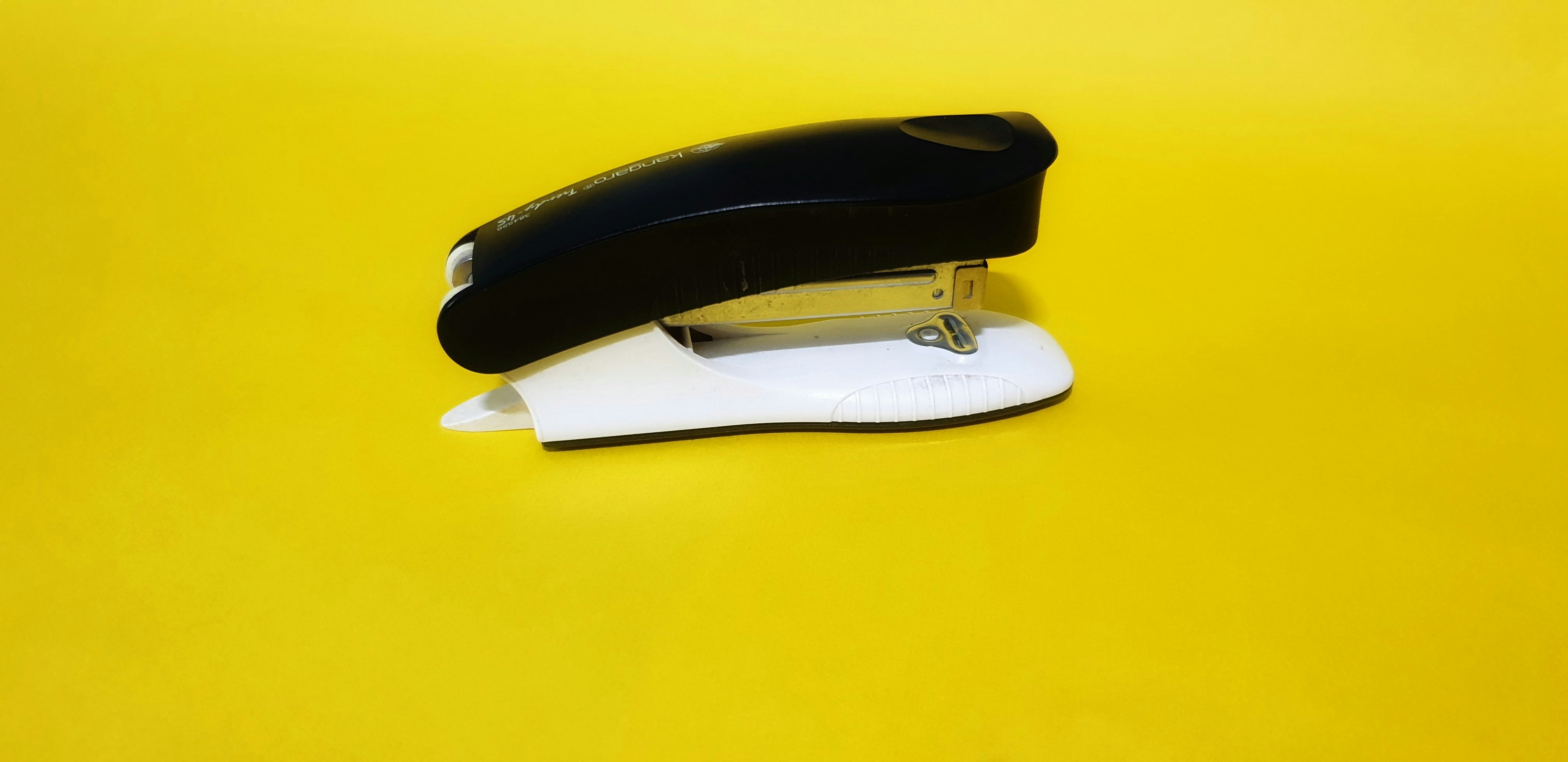 Black and white tape dispenser photo Free Phone Image on Unsplash