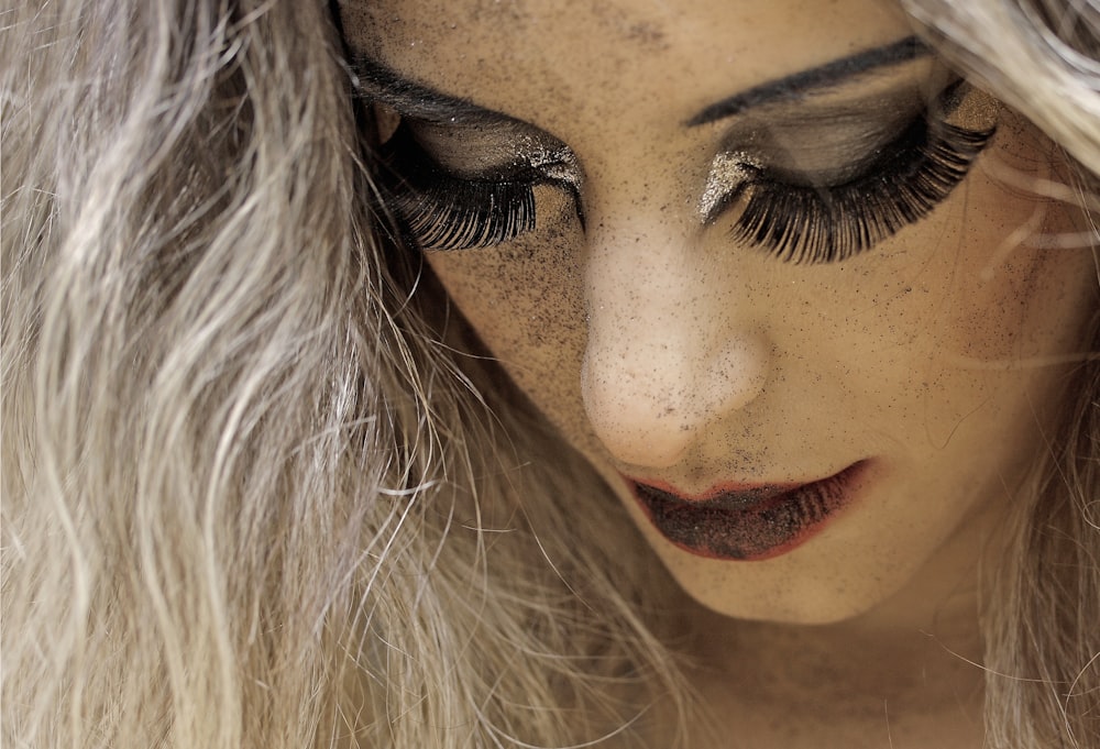 woman with blonde hair and red lipstick