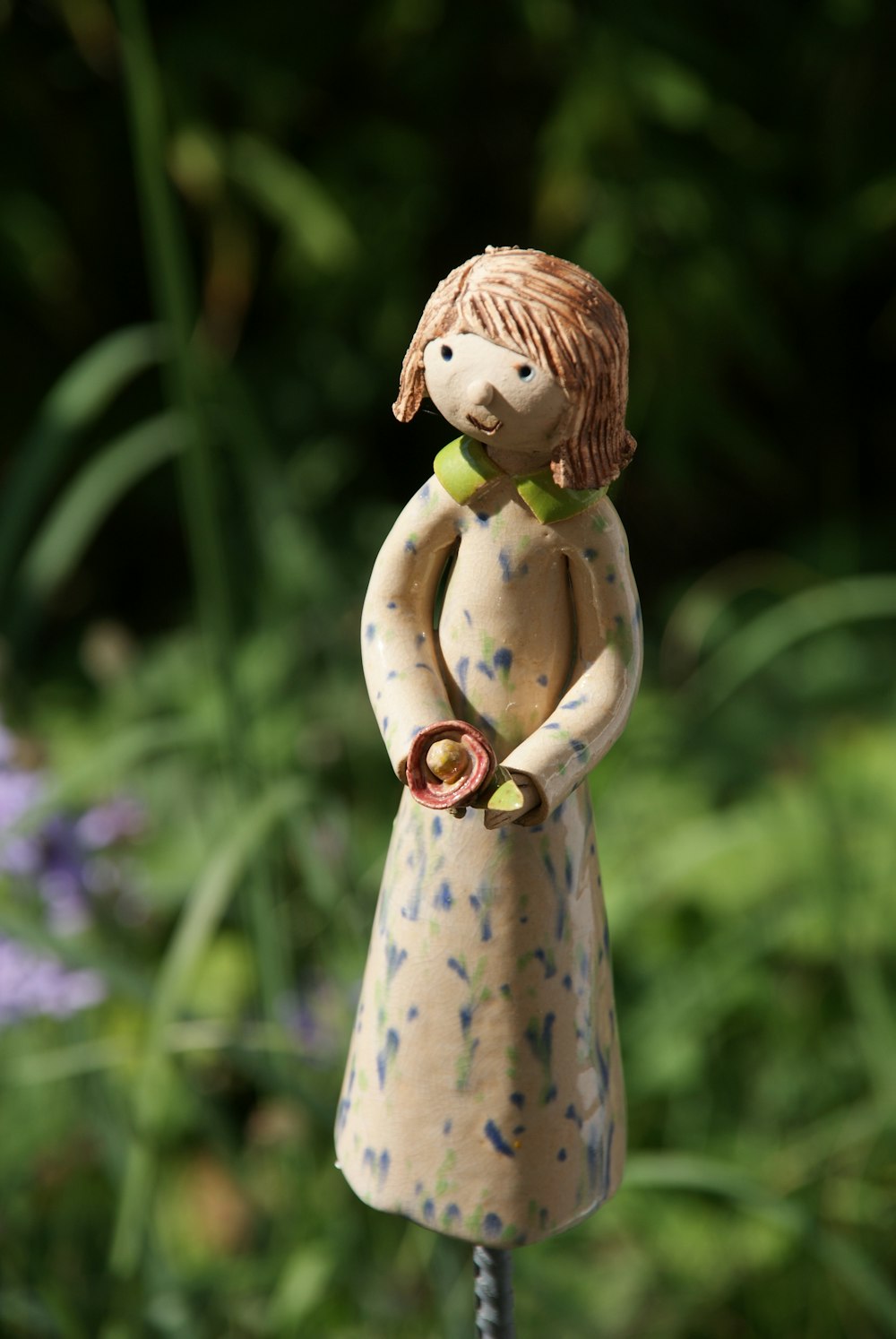 girl in white dress ceramic figurine