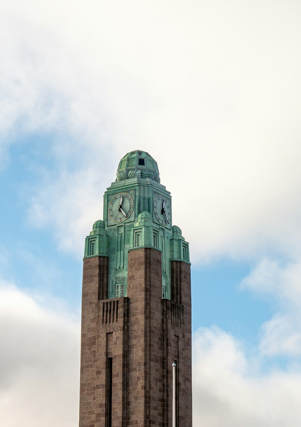 brown concrete building under blue sky during daytime