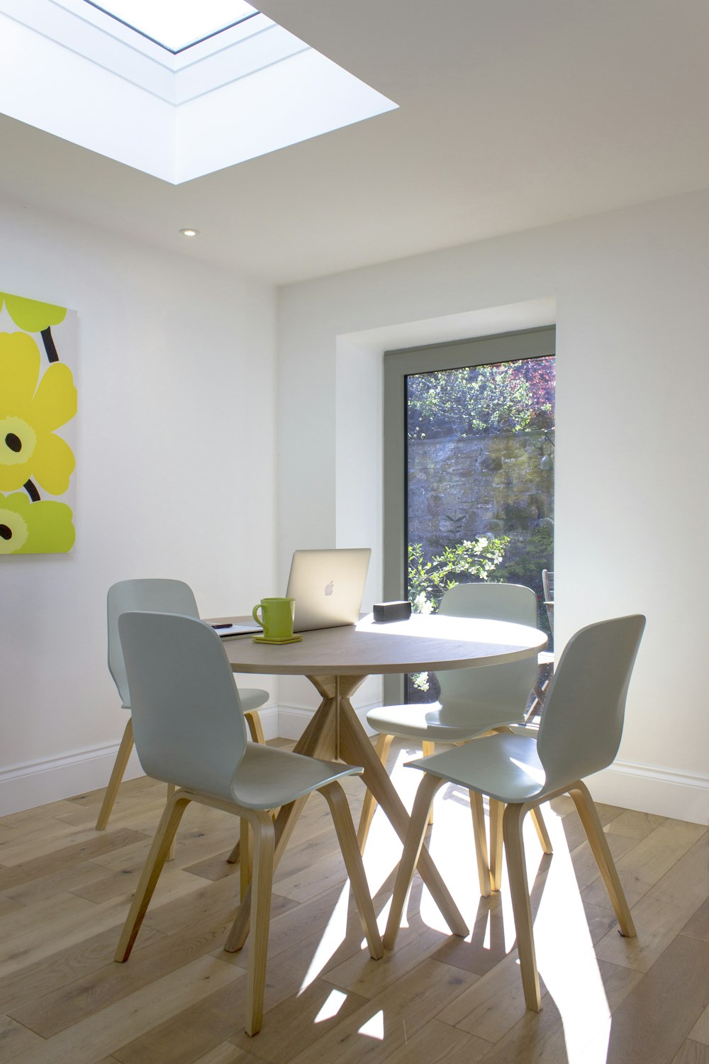 white and brown wooden table with chairs