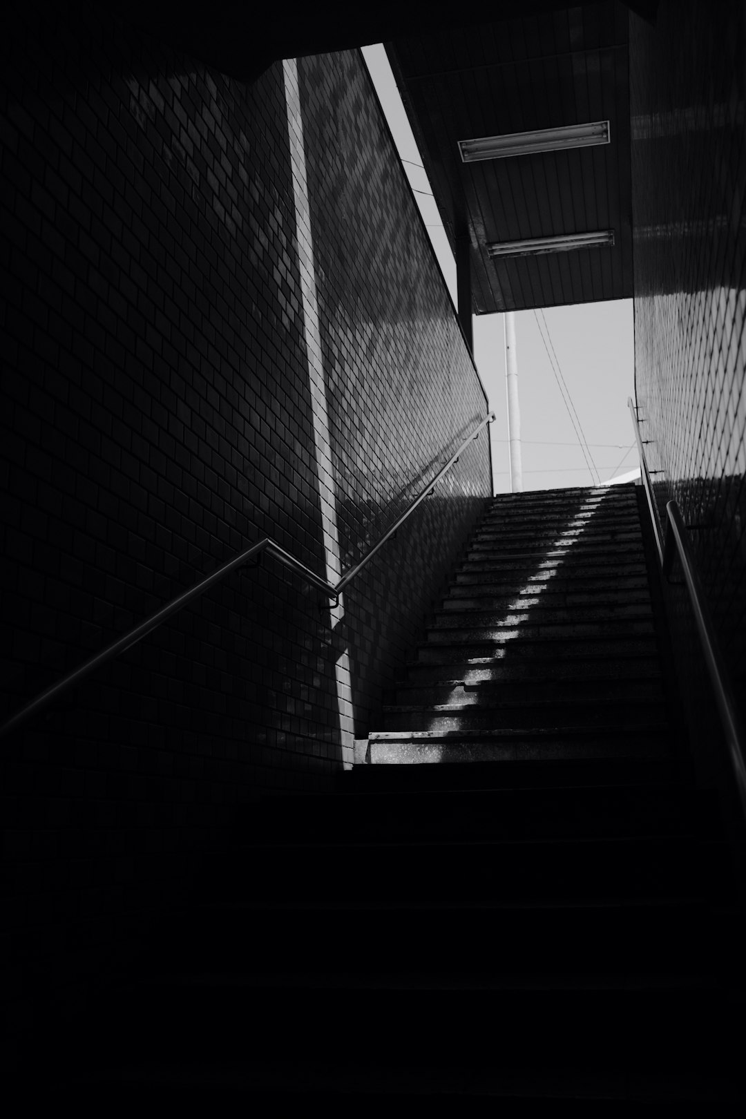 grayscale photo of a staircase