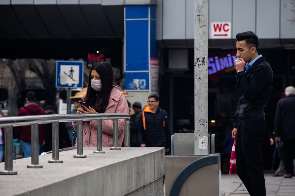 people walking on sidewalk during daytime