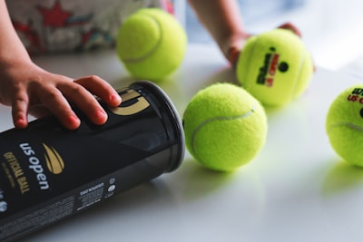 green tennis ball on white table us open tennis zoom background