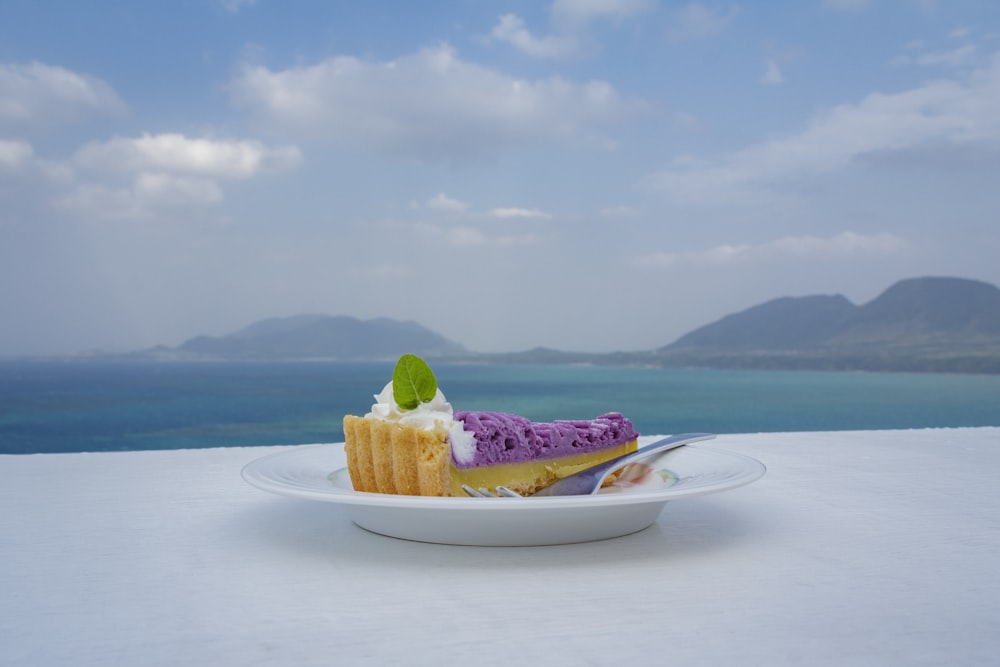 sliced cake on white ceramic plate