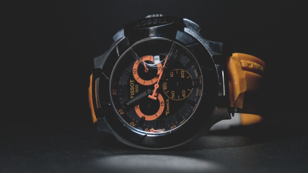 black and orange chronograph watch