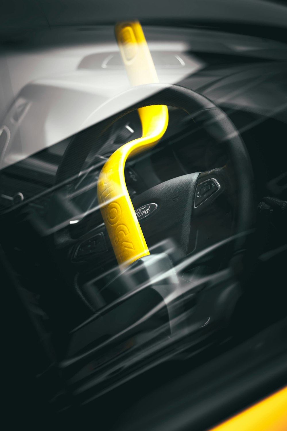 yellow and black car steering wheel