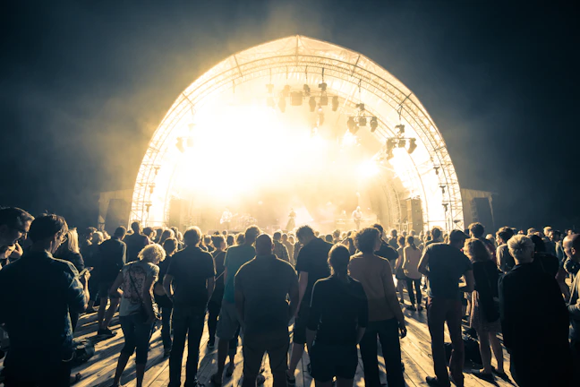 A large tent structure set up for an outdoor concert.
